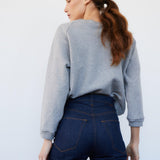 The Daily Sweatshirt in Heather Grey Back View Tucked In