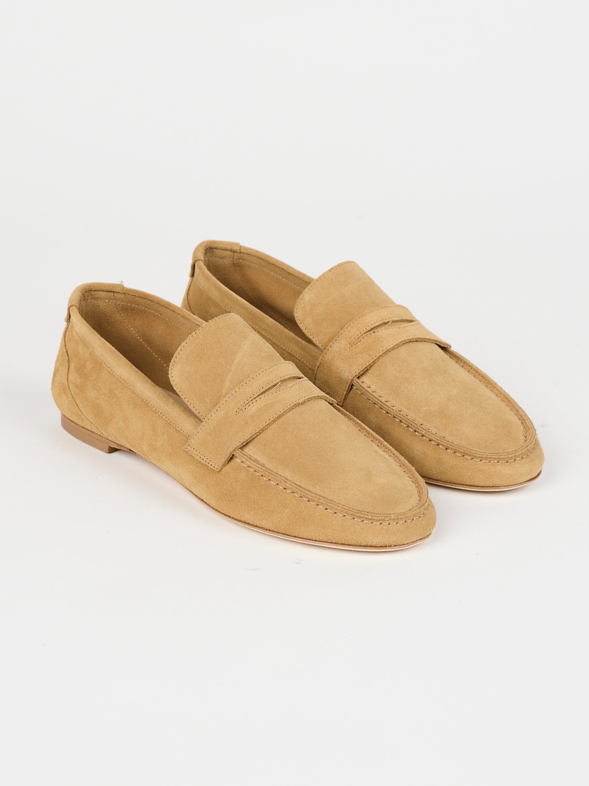 The Unlined Penny Loafer in Ambra