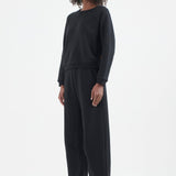 The Arc Lounge Pant in Black. On body front side - Jamie Haller