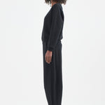 The Arc Lounge Pant in black. On body side - Jamie Haller