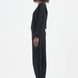 The Arc Lounge Pant in black. On body side - Jamie Haller