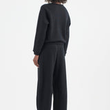 The Arc Lounge Pant in black. On body back side - Jamie Haller