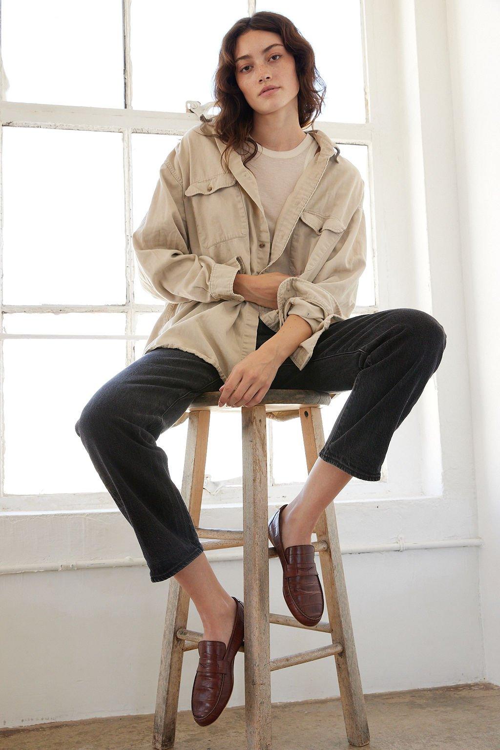 The Penny Loafer in Croc Brown on Body Sitting on Stool