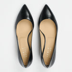 black heels on a white background