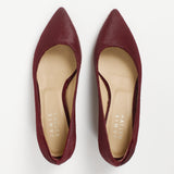 Top view of Jamie Haller claret ponyhair pointed toe kitten heel pumps with cream leather insoles and elegant cutout sides