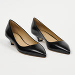 black heels on a white background
