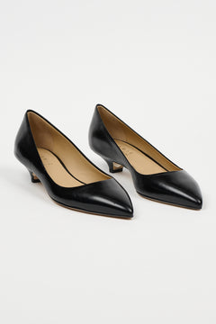 black heels on a white background