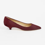 Jamie Haller claret ponyhair pointed toe kitten heel pump shown in profile with a low sculpted heel and soft leather lining