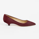 Jamie Haller claret ponyhair pointed toe kitten heel pump shown in profile with a low sculpted heel and soft leather lining