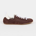 brown sneaker in a white background