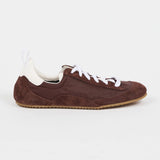 brown sneaker in a white background
