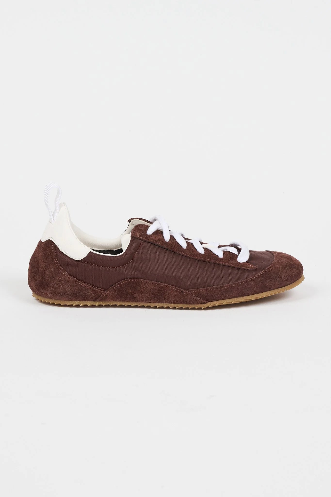 brown sneaker in a white background