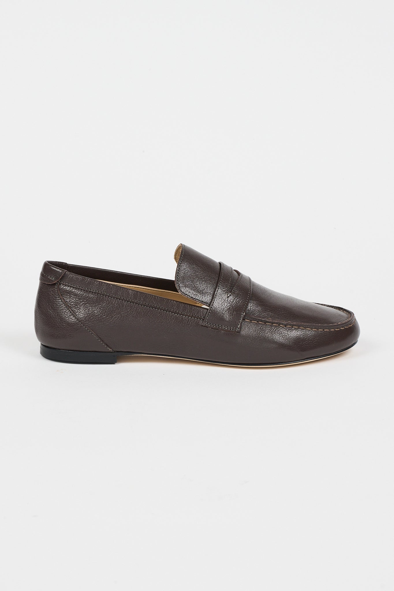 side view of a single loafer