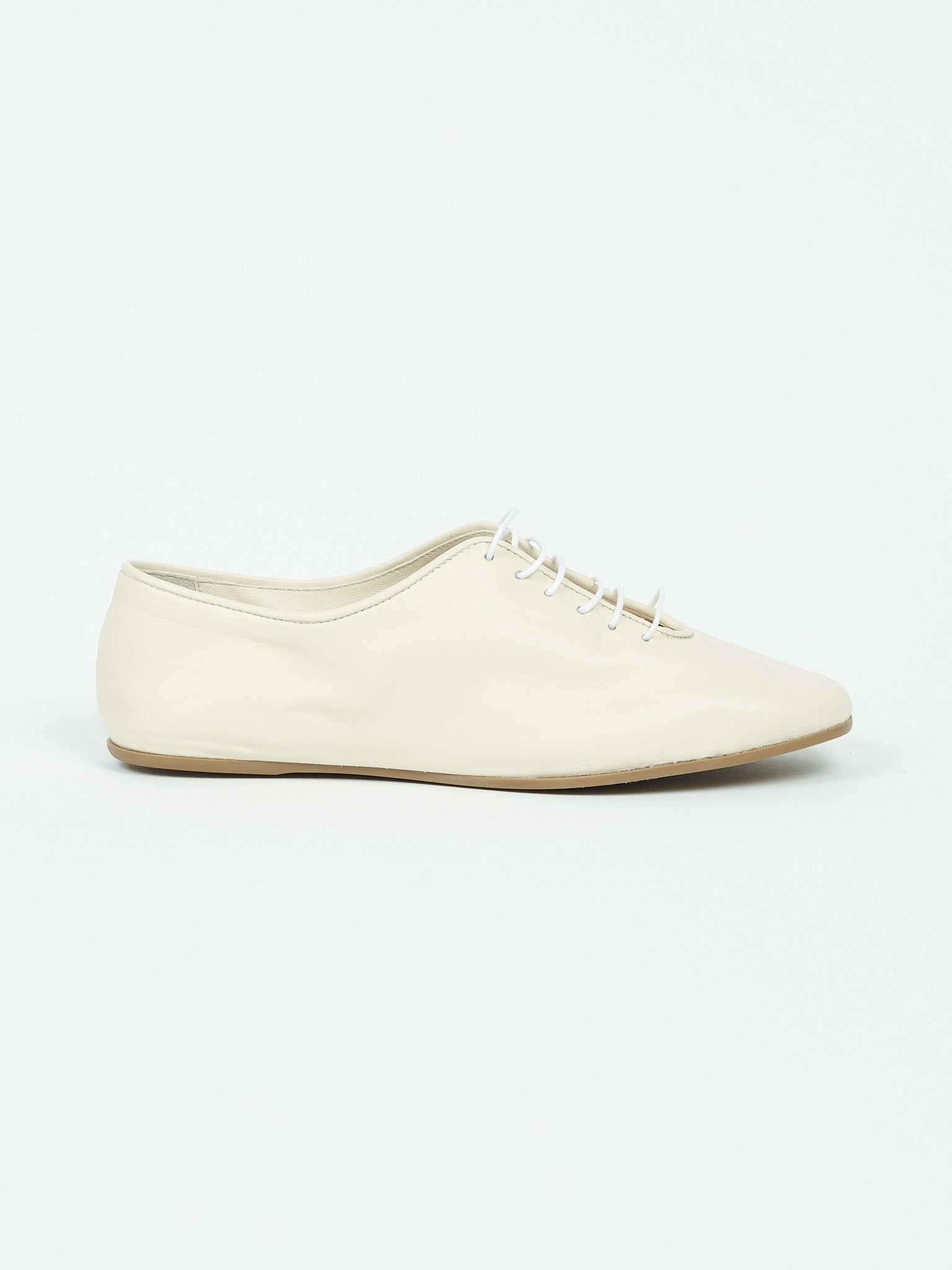 The Jazz Slipper in Latte