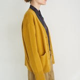 The Welt Pocket Cashmere Cardigan in Gold