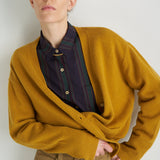The Welt Pocket Cashmere Cardigan in Gold