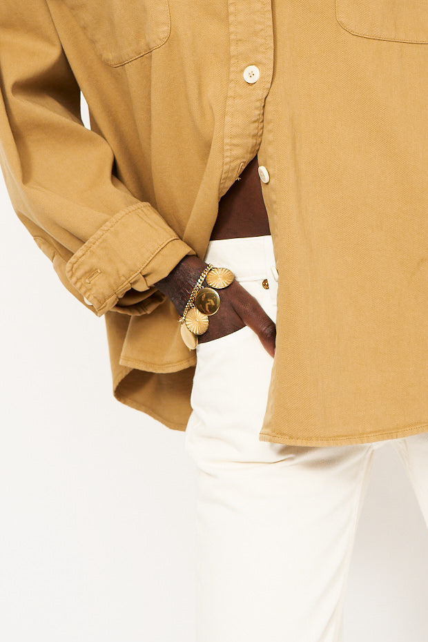 The Chaos Sunburst Charm Bracelet in Gold