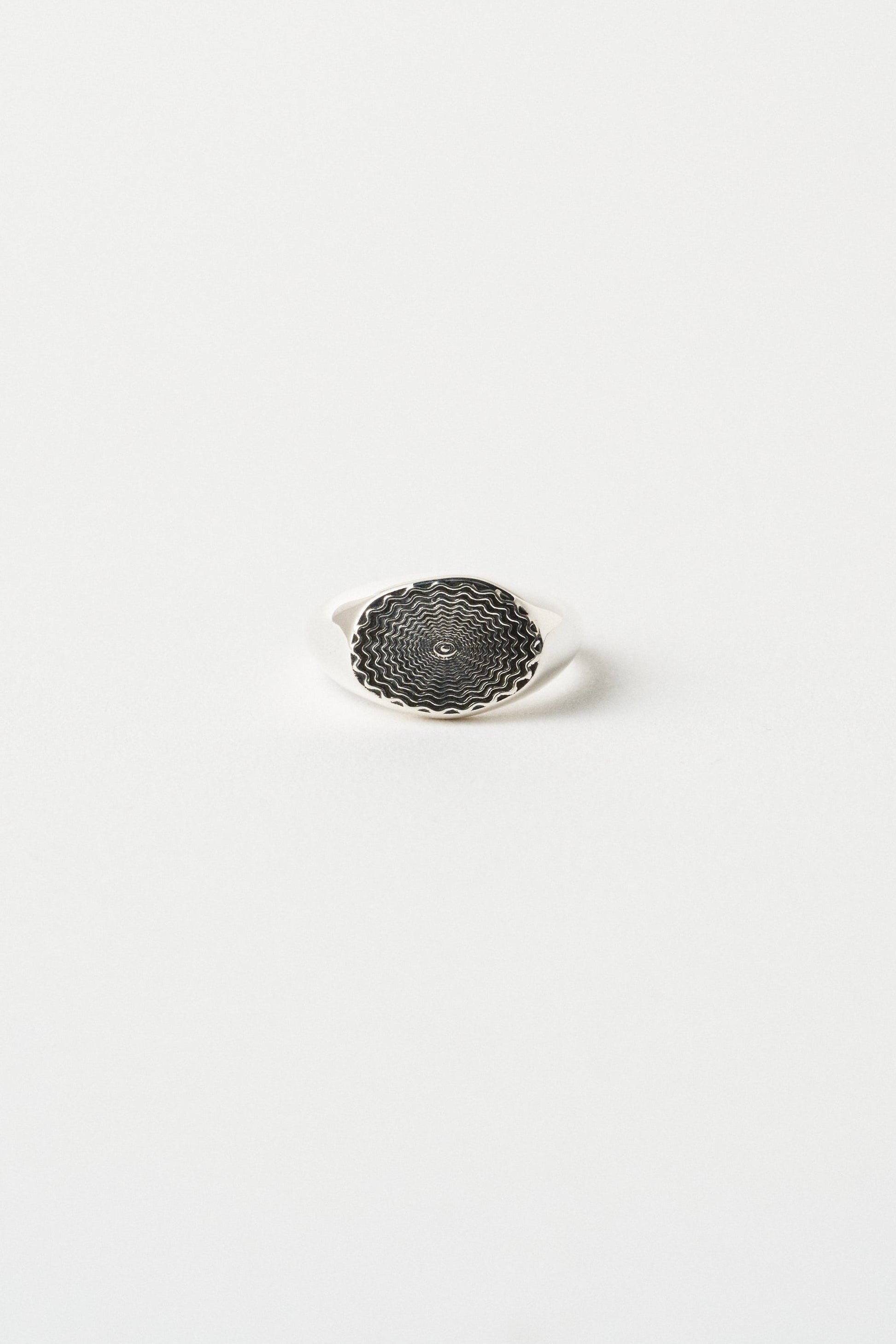 The Chaos Sunburst Oval Signet in Sterling Silver