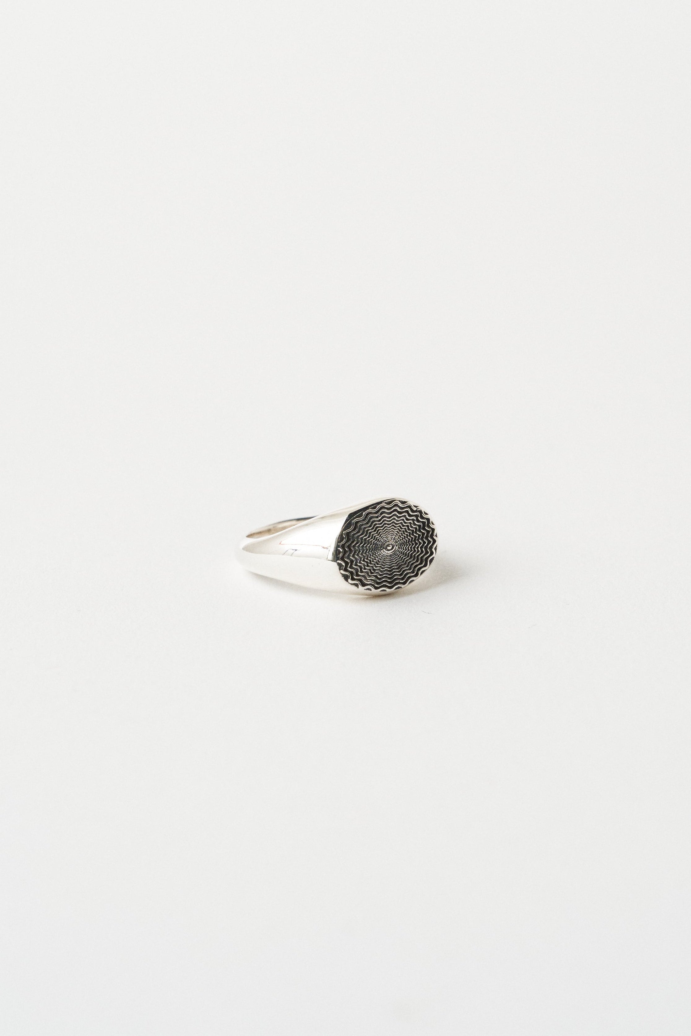 The Chaos Sunburst Oval Signet in Sterling Silver