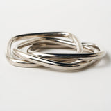 The Interlocking Bangle in Sterling Silver
