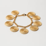 The Chaos Sunburst Charm Bracelet in Gold