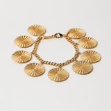 The Chaos Sunburst Charm Bracelet in Gold