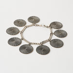 The Chaos Sunburst Charm Bracelet in Sterling Silver