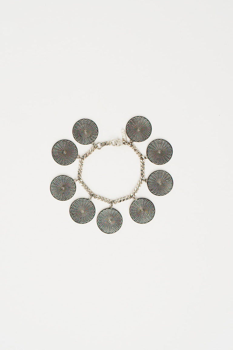 The Chaos Sunburst Charm Bracelet in Sterling Silver