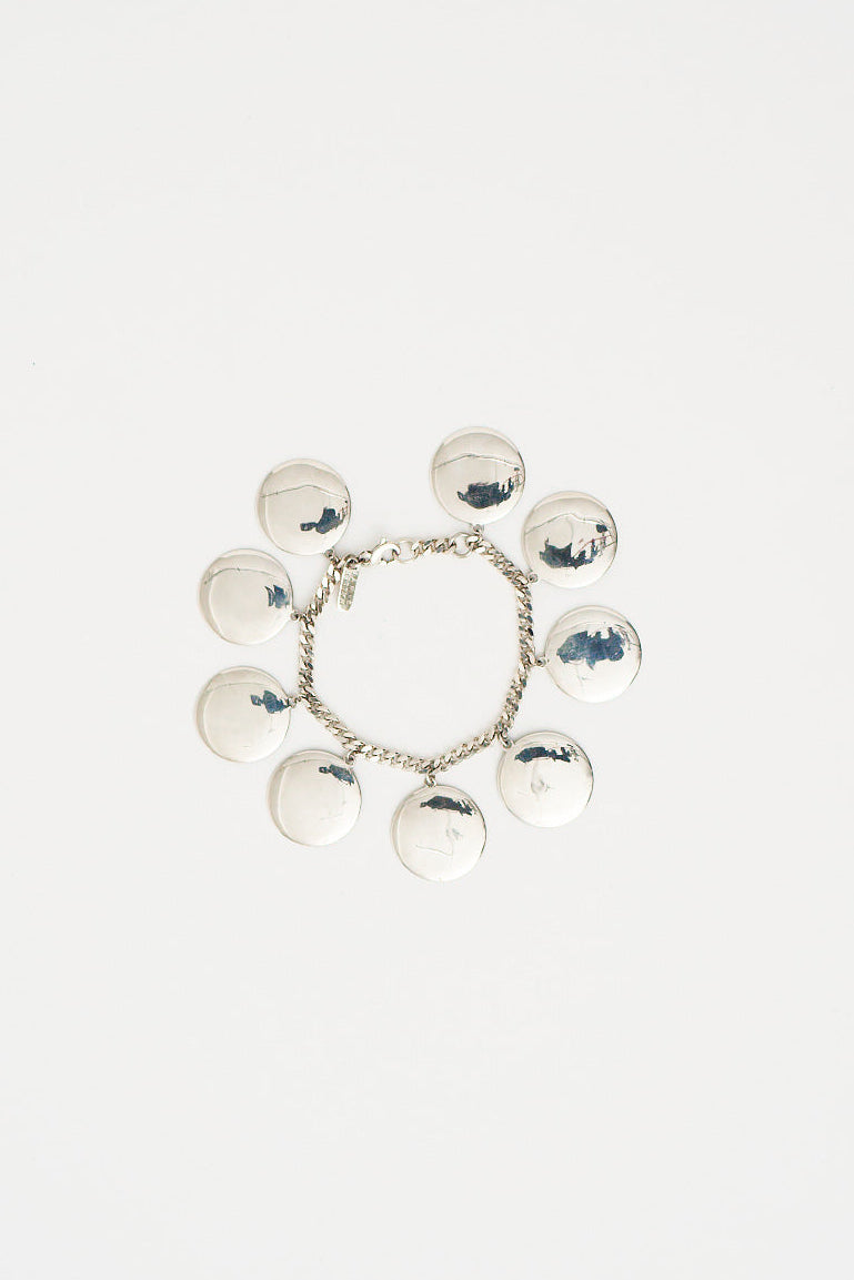 The Chaos Sunburst Charm Bracelet in Sterling Silver