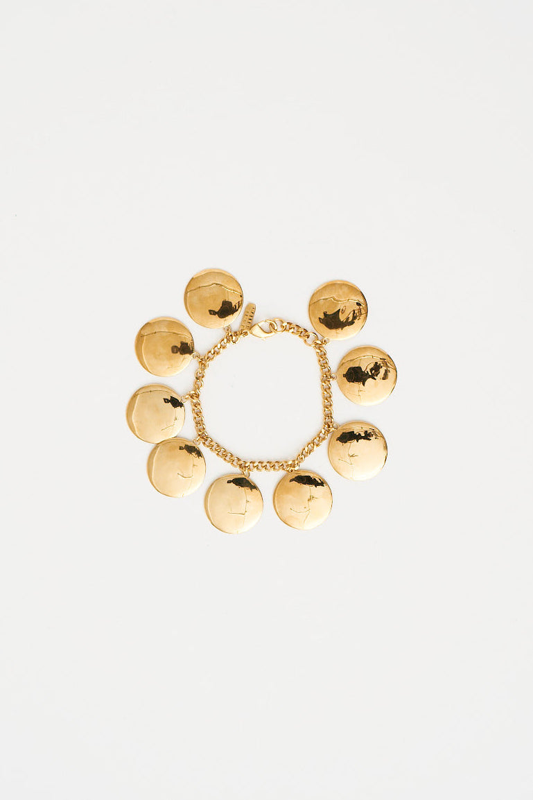 The Chaos Sunburst Charm Bracelet in Gold