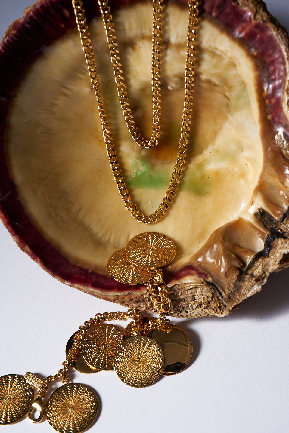 The Chaos Sunburst Charm Bracelet in Gold
