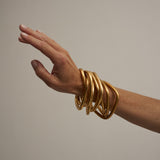 The Interlocking Bangle in Gold