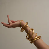 The Interlocking Bangle in Gold