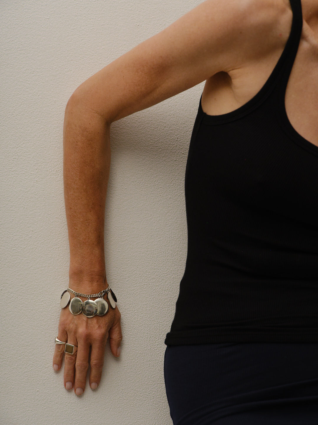 The Chaos Sunburst Charm Bracelet in Sterling Silver