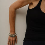 The Chaos Sunburst Charm Bracelet in Sterling Silver