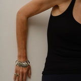 The Chaos Sunburst Charm Bracelet in Sterling Silver