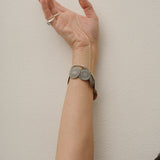 The Chaos Sunburst Charm Bracelet in Sterling Silver