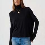 The Draped Turtleneck in Black