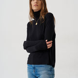 The Draped Turtleneck in Black