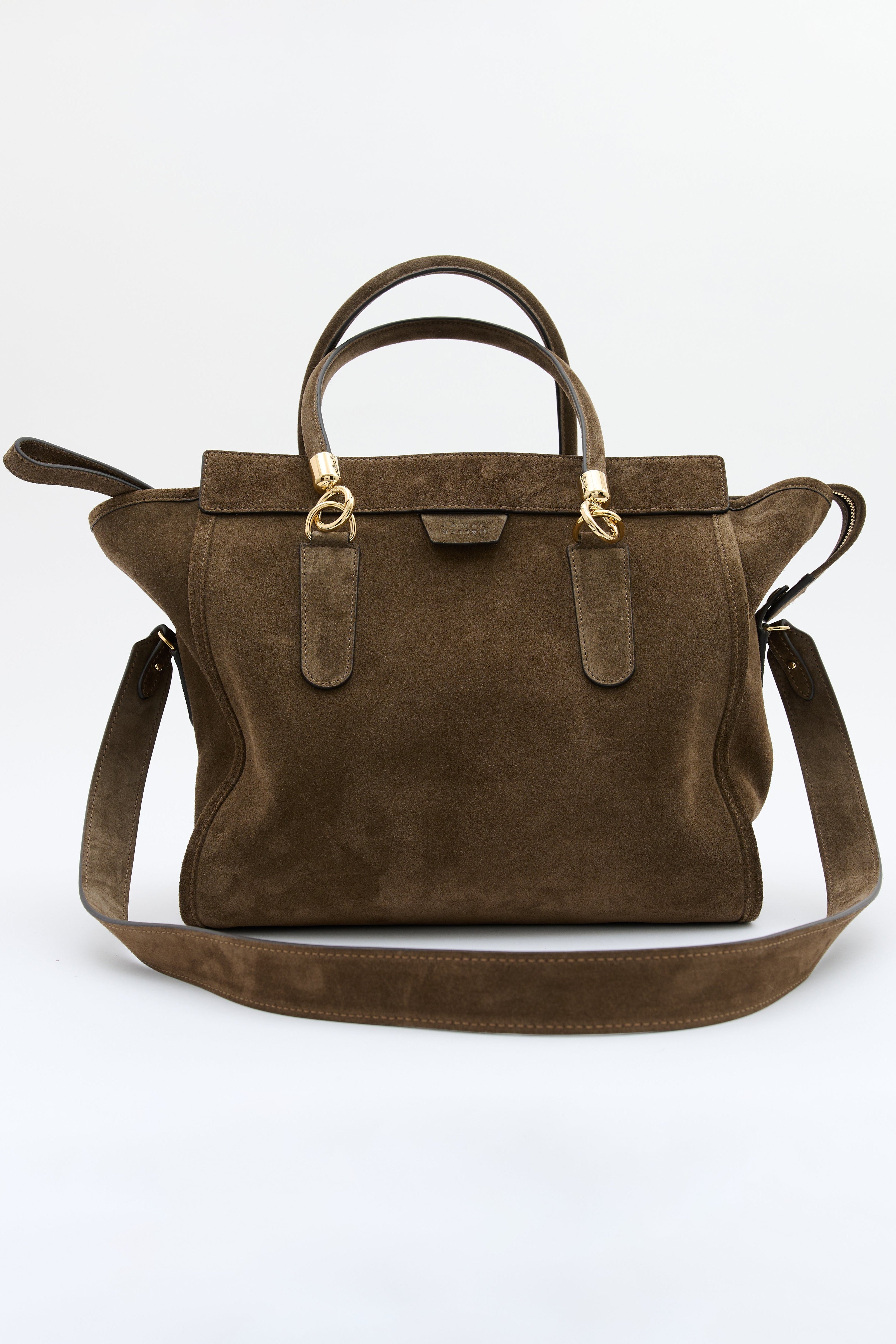 An olive suede handbag with gold-tone hardware, featuring dual top handles and a detachable shoulder strap, photographed against a clean white background.