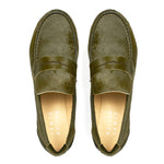 Top view of Jamie Haller moss green ponyhair penny loafers with classic strap detail, leather soles, and soft tan insoles on a white background