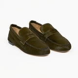 Jamie Haller moss ponyhair penny loafers shown as a pair with moc toe stitching and classic penny straps on a white background