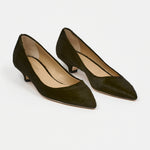 A pair of dark olive green pointed-toe pumps with kitten heels, shown on a clean white background.