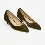 Jamie Haller moss ponyhair kitten heel pumps with pointed toes, soft leather insoles, low heels, and sleek polished silhouettes shown as a pair