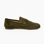 Olive green ponyhair penny loafer by Jamie Haller shown in side profile with a stitched moc toe vamp low stacked heel and leather sole