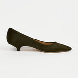 A single black woven Mary Jane flat shoe with a braided strap and pointed toe, shown in profile against a light gray background.
