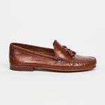 brown leather loafers on a white background