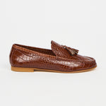 brown loafers on a white background