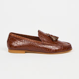 brown loafers on a white background