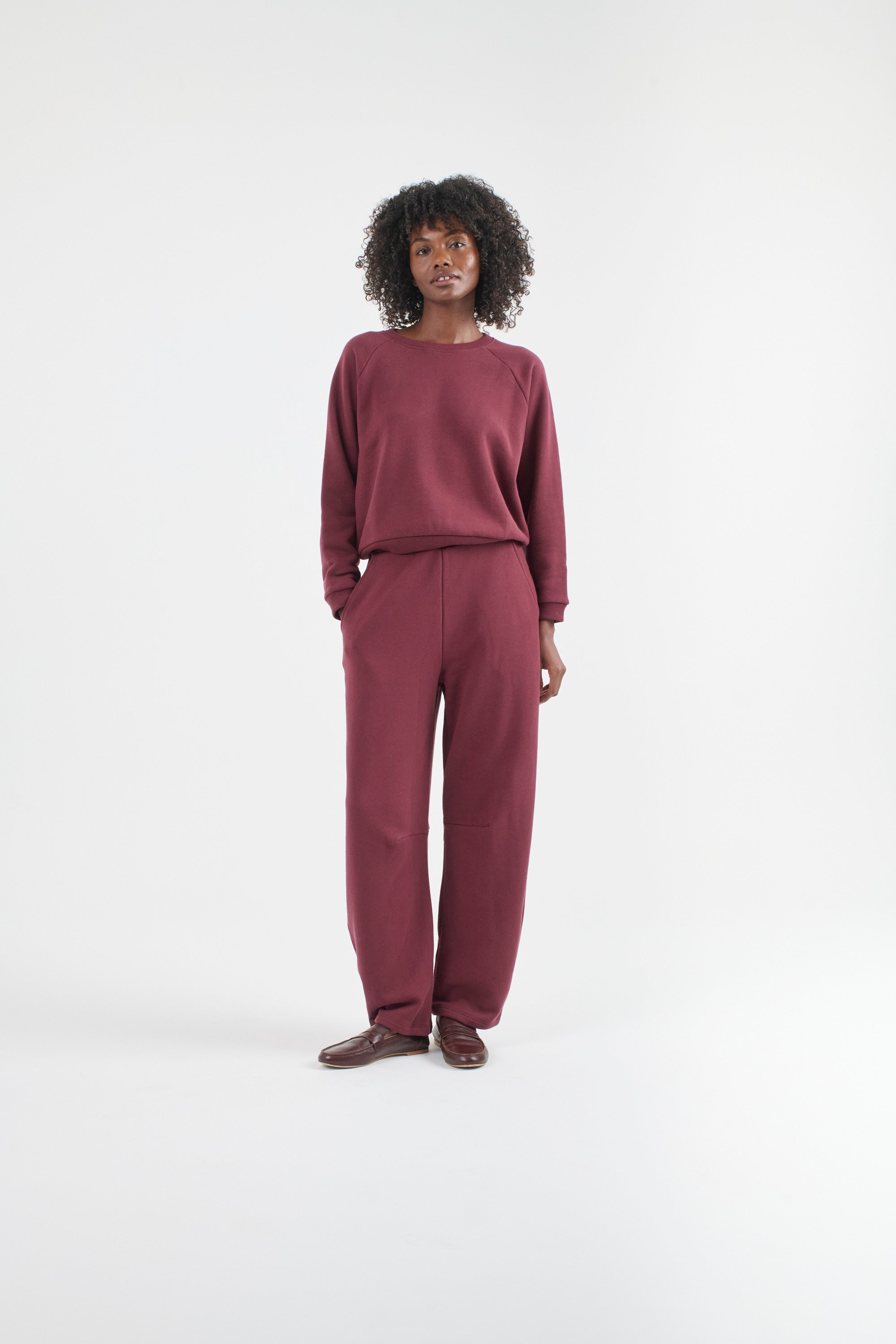 The Daily Sweatshirt in Cherry Cola. On body front - Jamie Haller